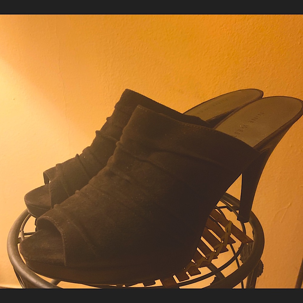 Nine West brown suede 4.5” platform heels.